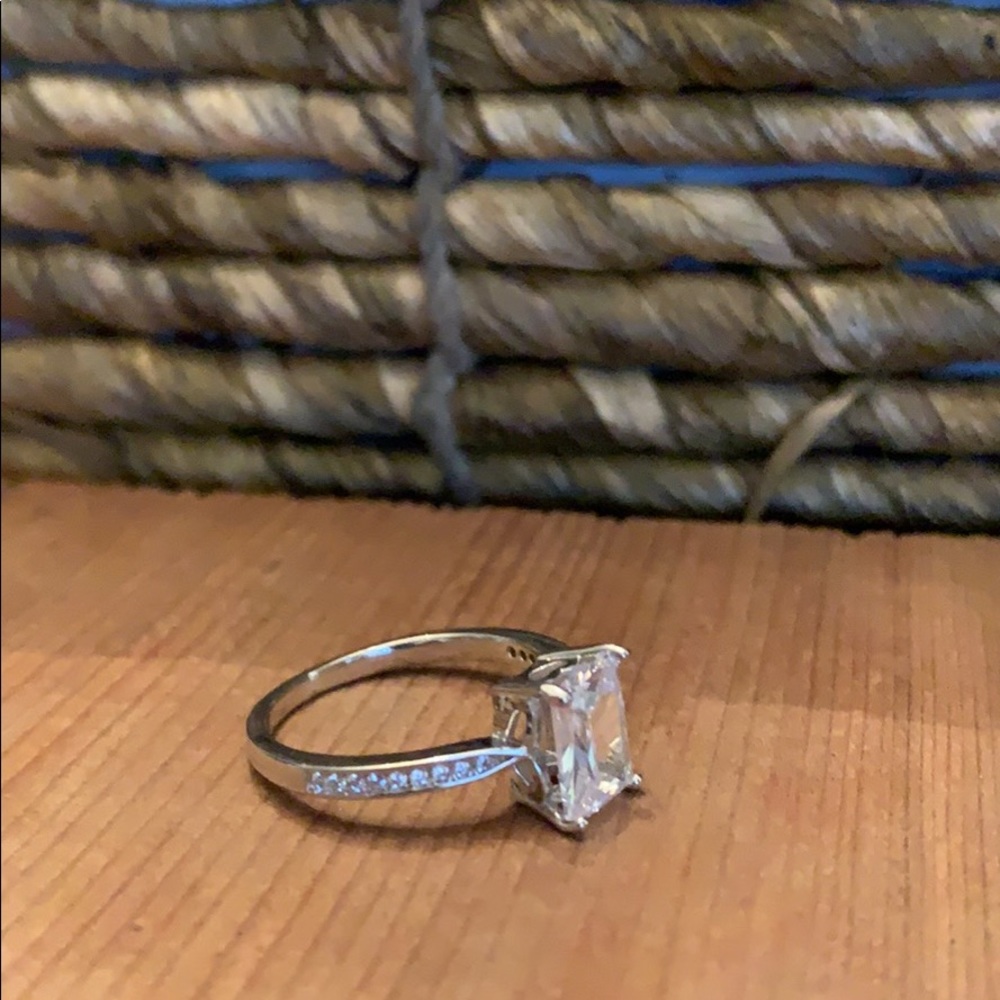 Emerald cut engagement ring